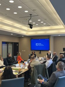 Members of the 2025–26 Excellence in Governance Fellowship cohort participate in a trustee panel discussion during a session at the Michigan Health & Hospital Association.